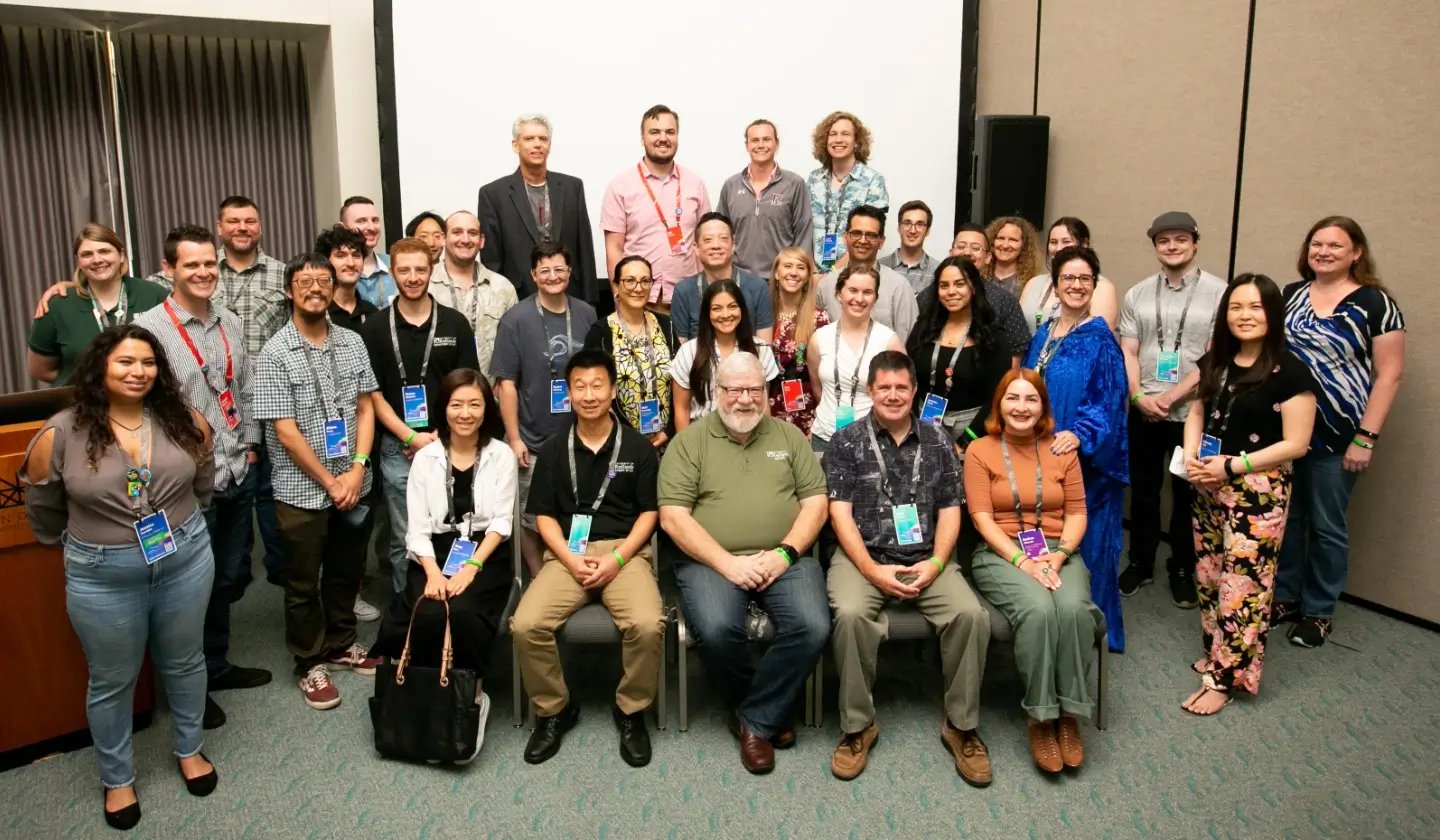 a group of people posing for a photo