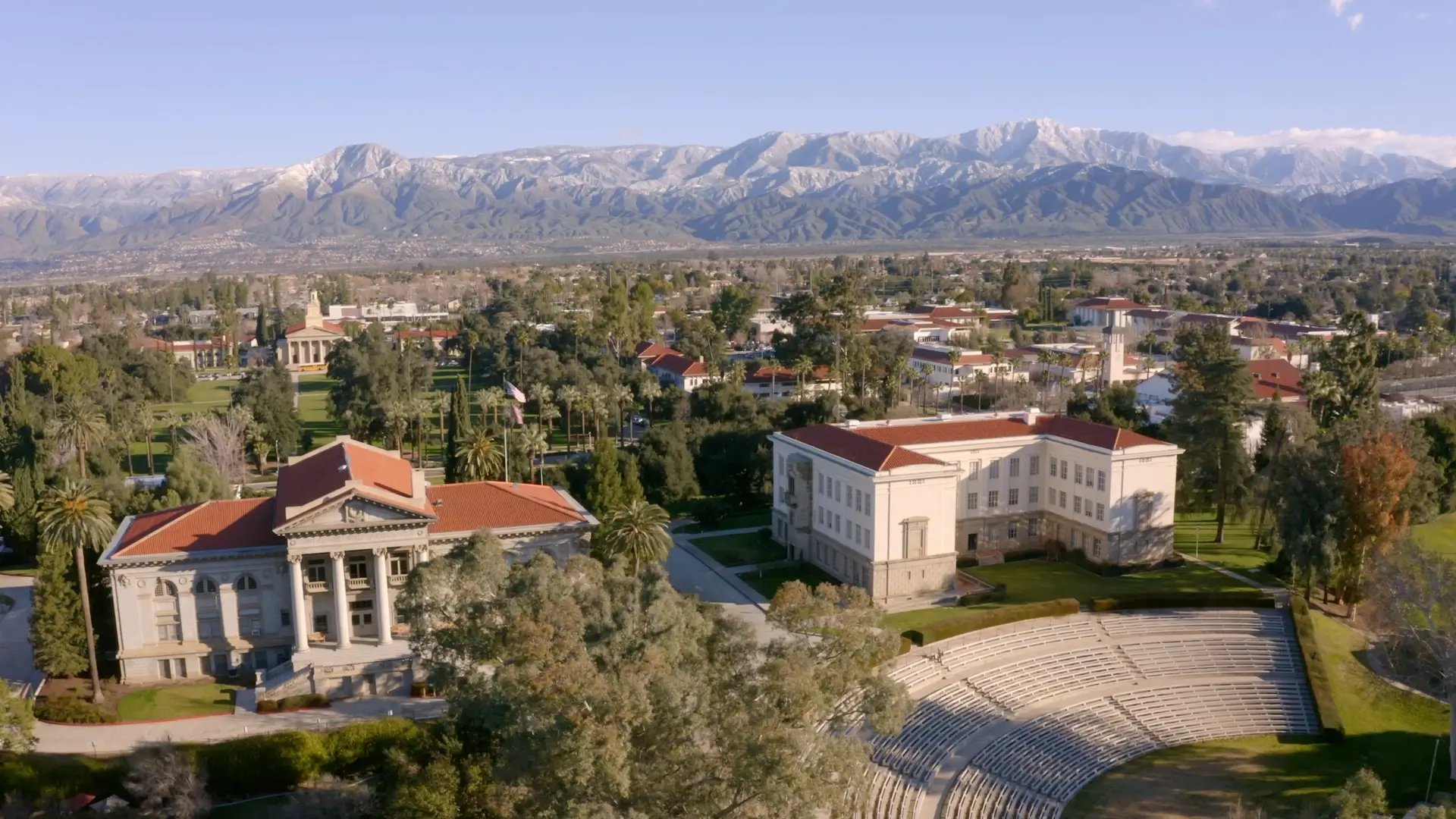 a building with a large building and a stadium