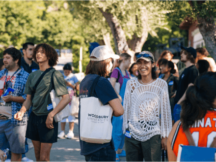 a group of people standing outside