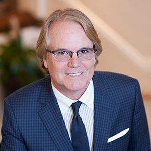 a man in a suit and tie