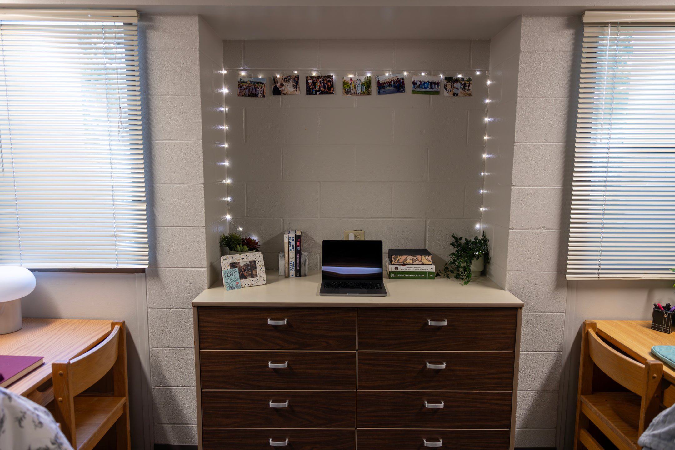 a laptop on a dresser