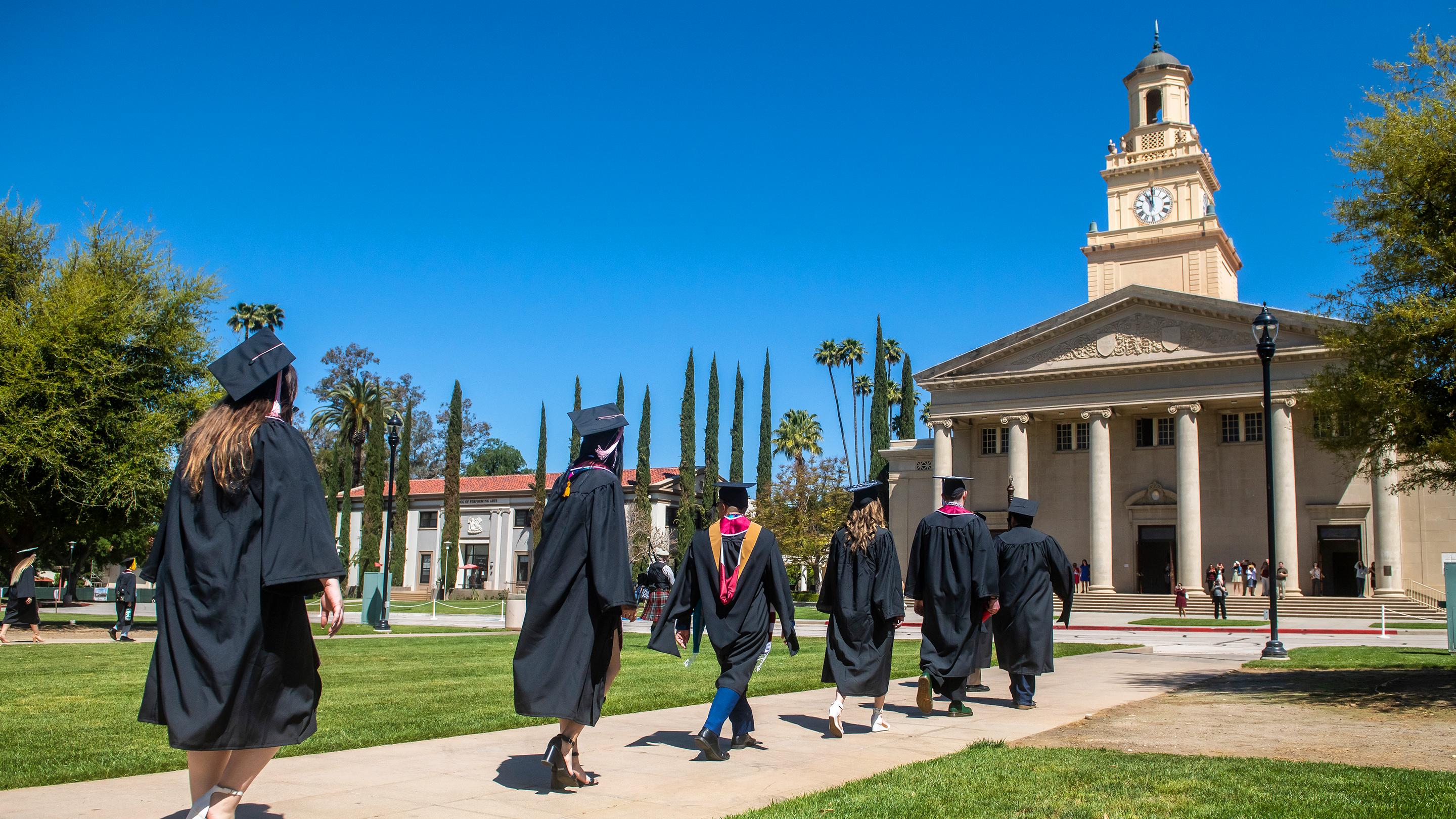 Media masthead - Students processing during commencement event