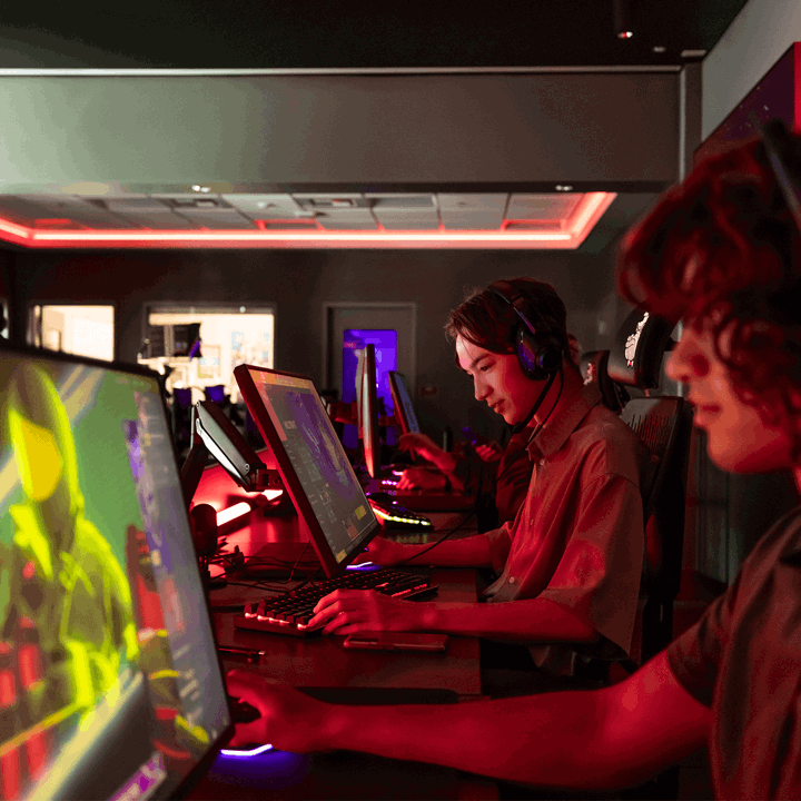 A group of Esports student team members playing a team match.