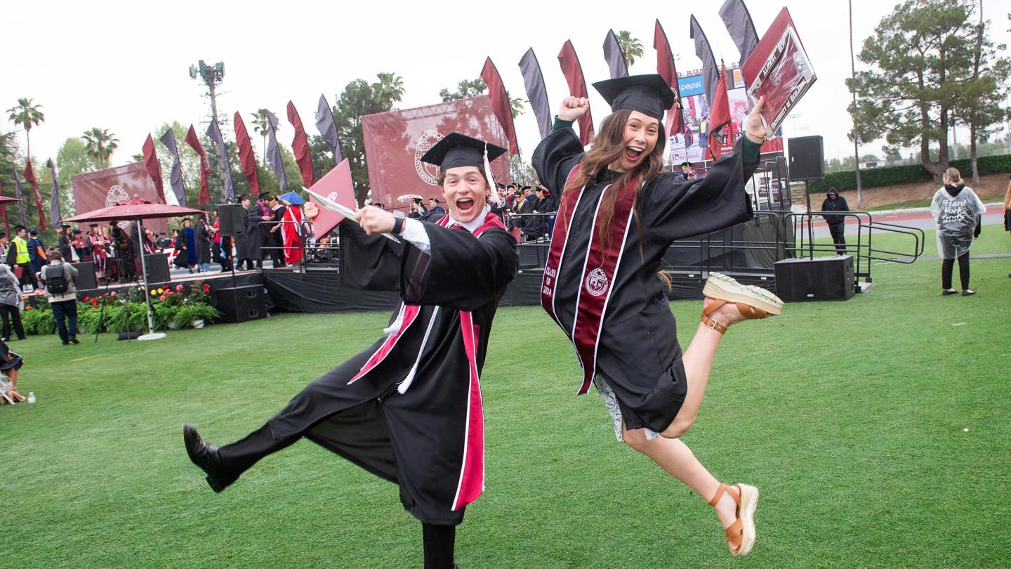 Media masthead - Graduating students leaping for joy and celebrating graduation