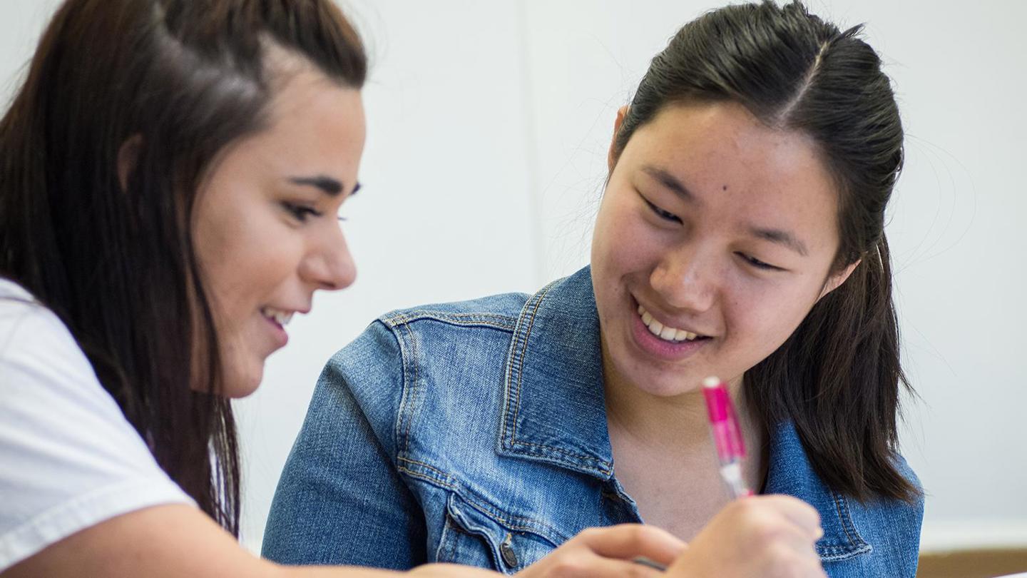 Image card - Two students learning together