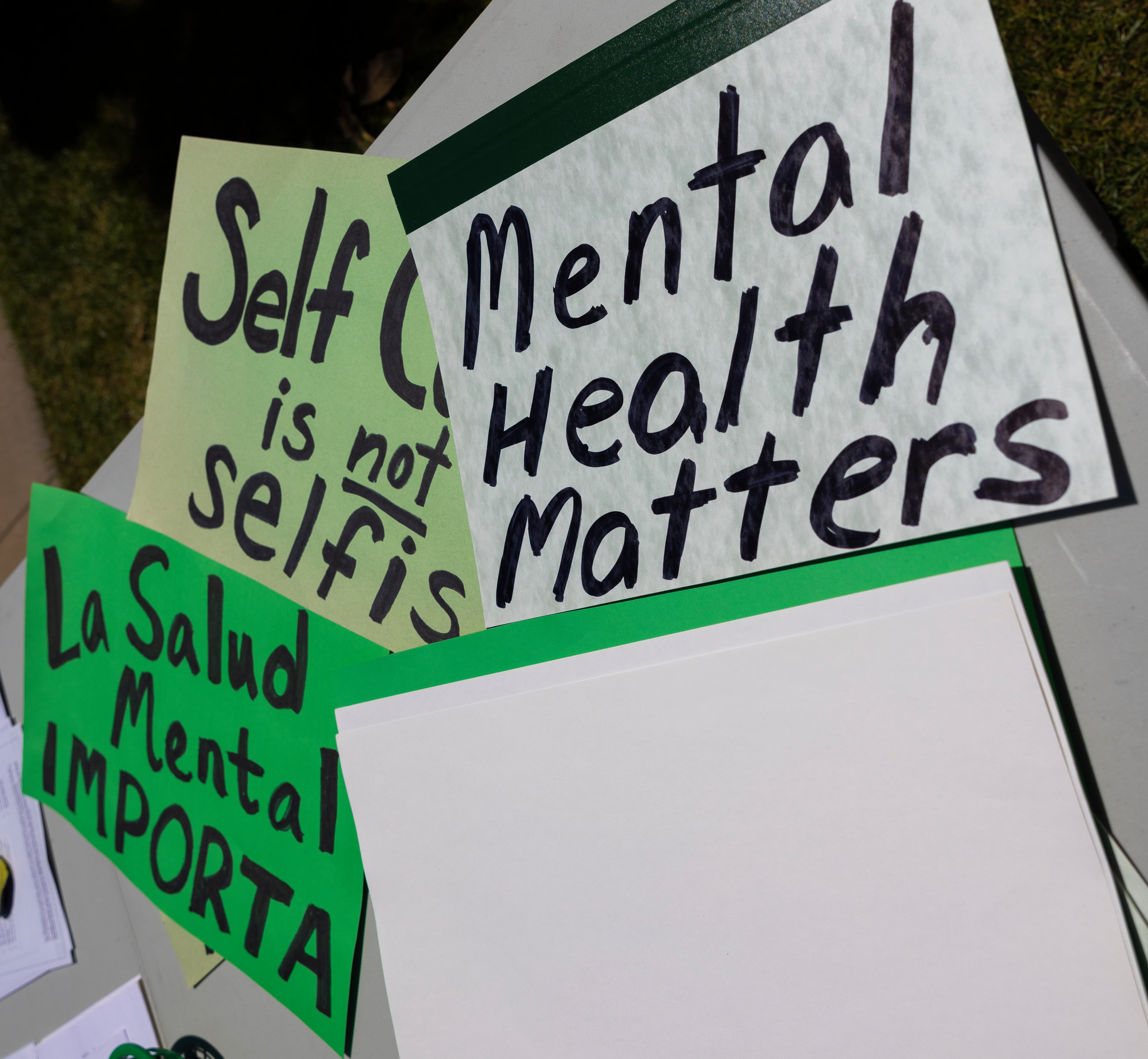 a group of signs on a wall