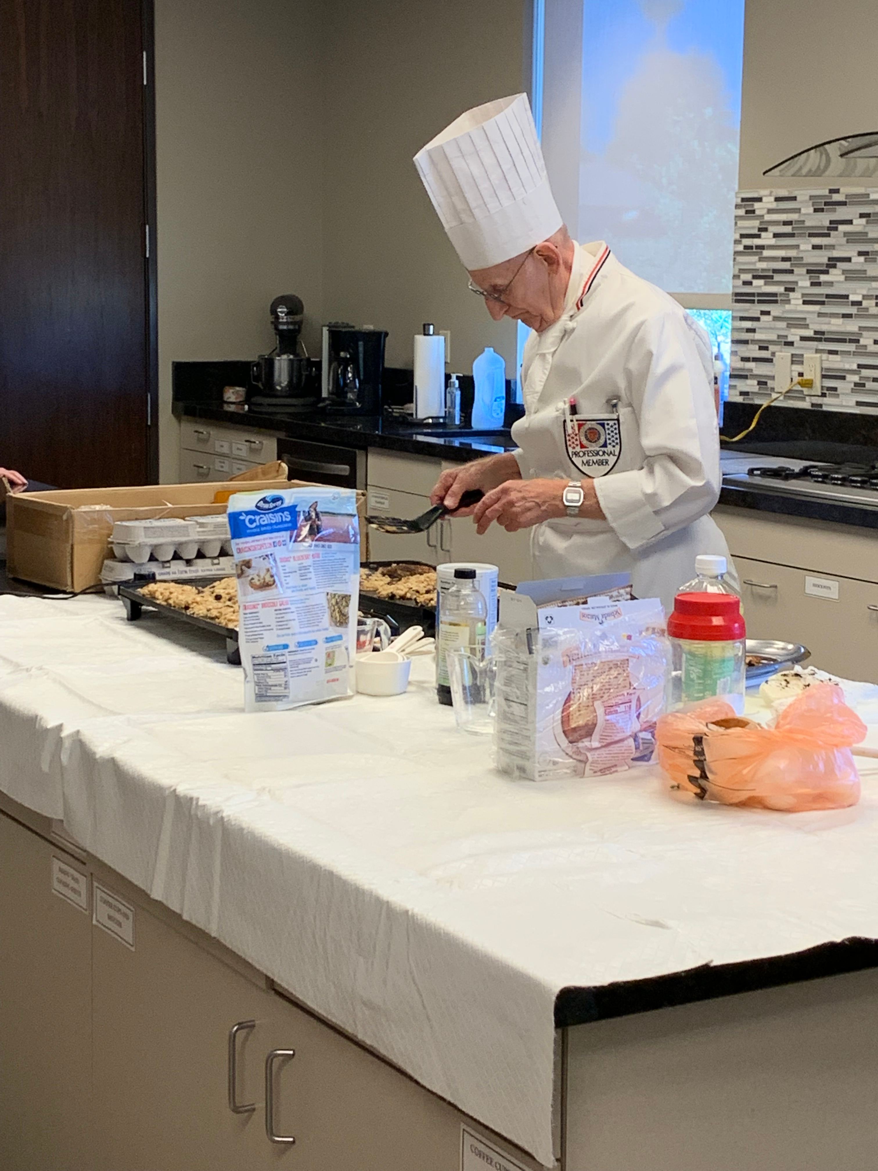 a man in a chef's hat cooking