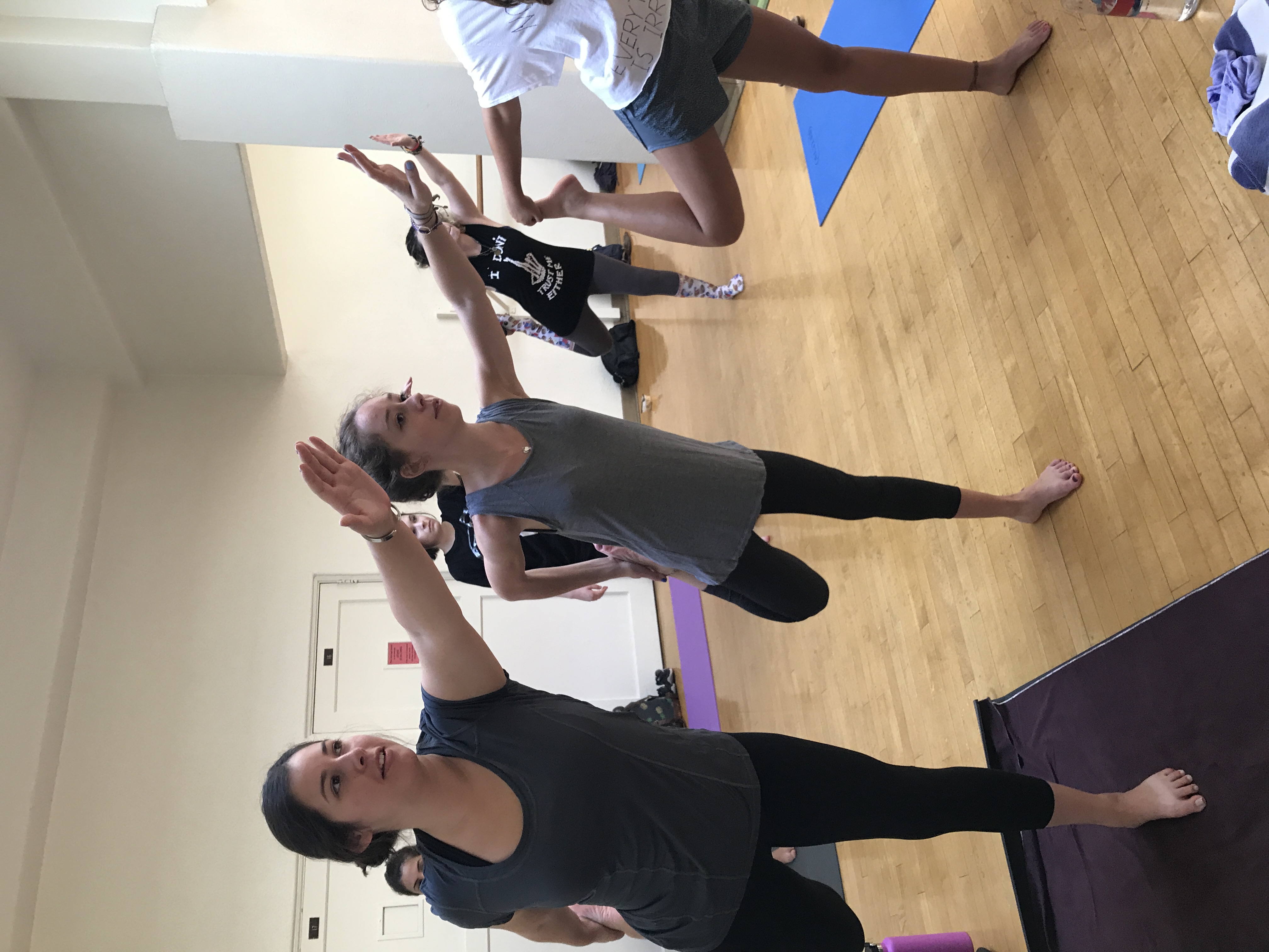 a group of people doing yoga