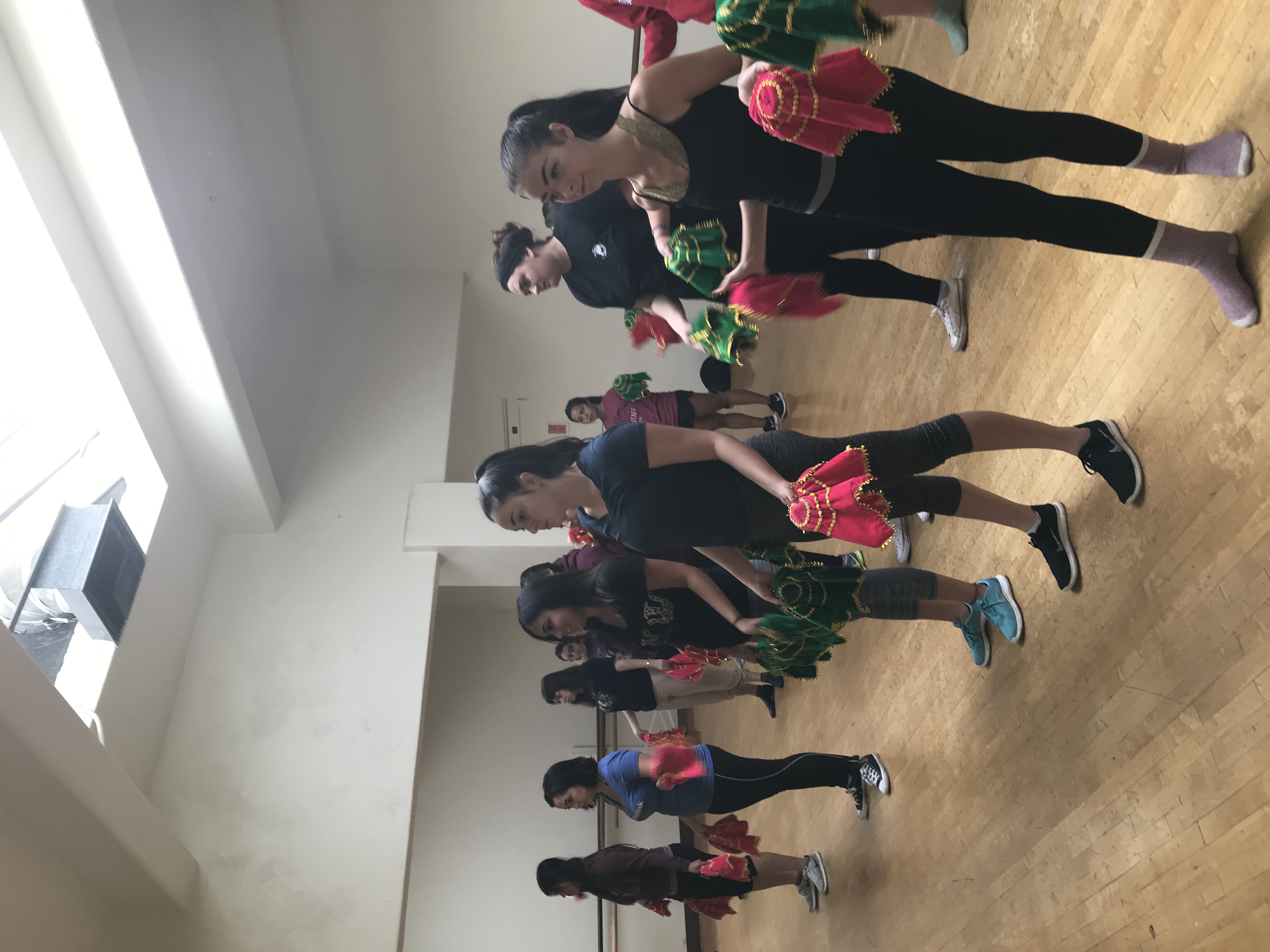 a group of women holding towels