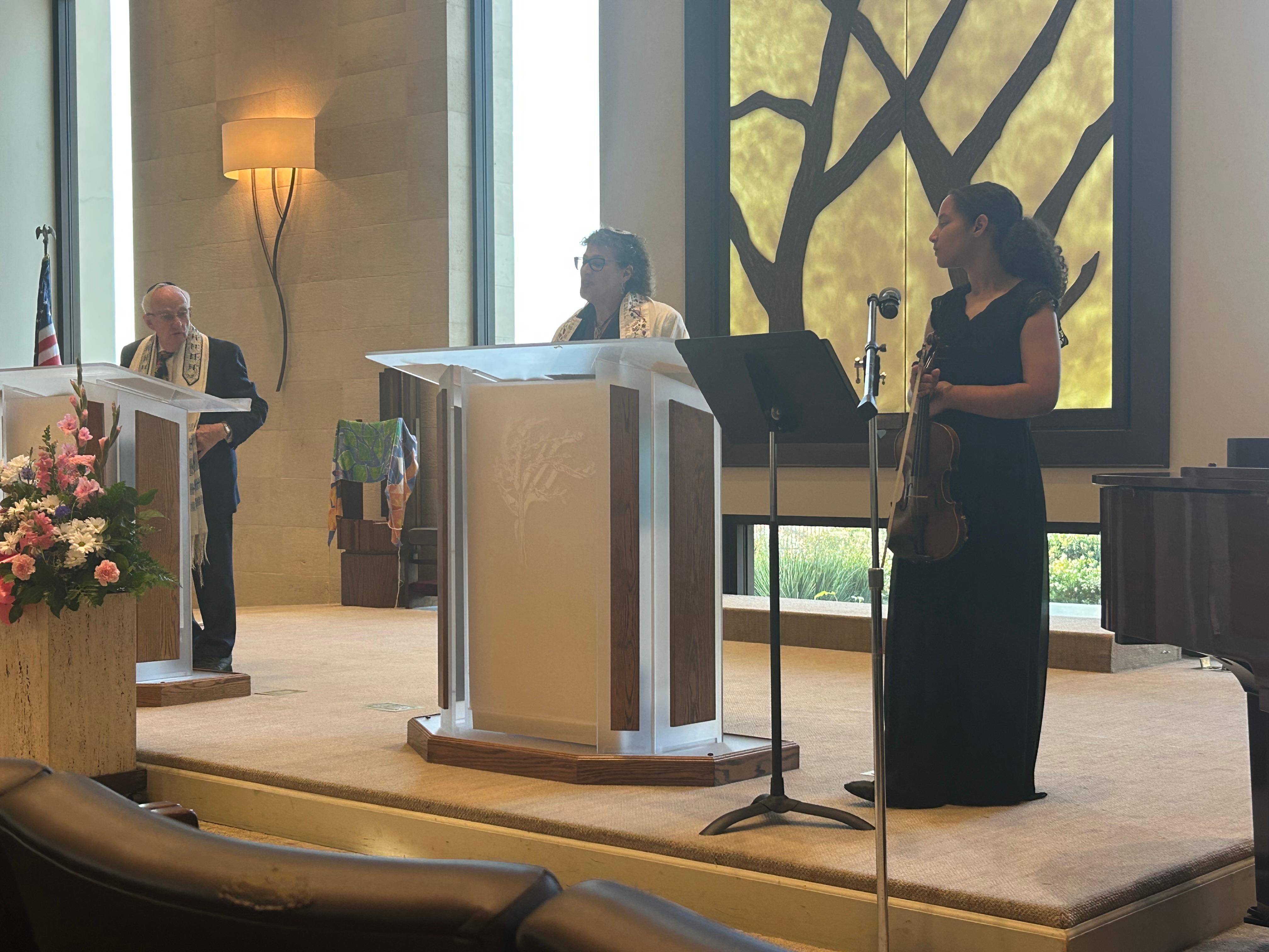 a group of people standing at podiums